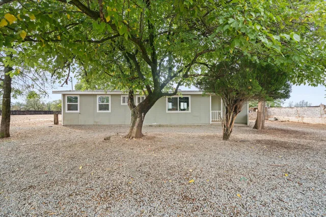 a picture of a bathroom with a shower