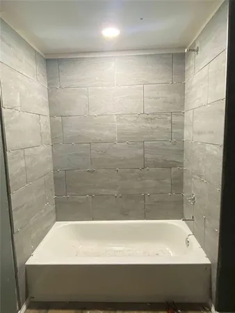 a bathroom with a bathtub