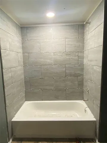 a bathroom with a bathtub