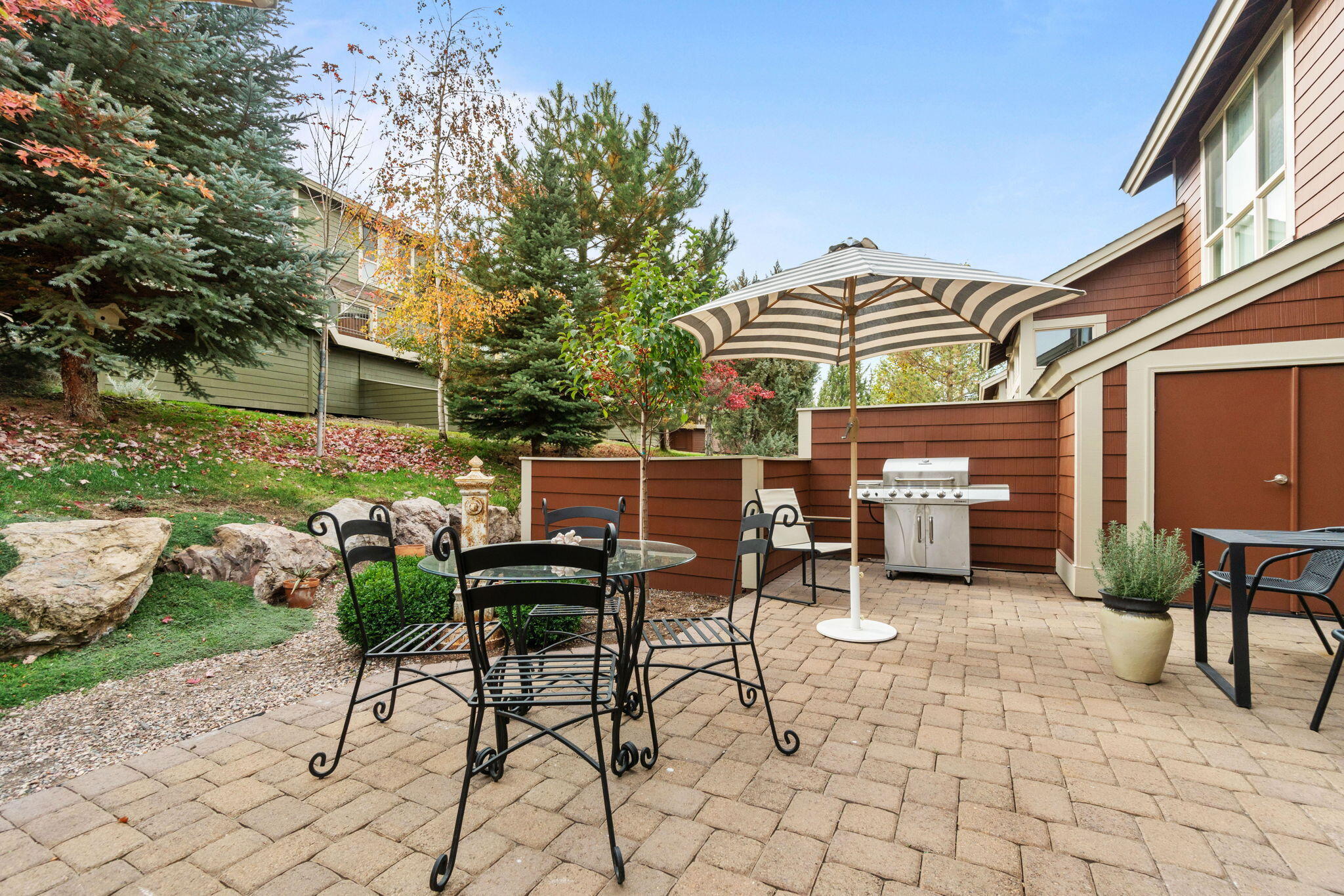 10942 Village Loop Redmond, OR 97756 - Photo 43 of 45 a view of a chairs and table in backyard of the house