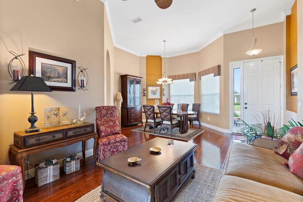 11839 Southeast 173rd Ln Road Summerfield, FL 34491 - Photo 12 of 49 a living room with furniture and next to a window