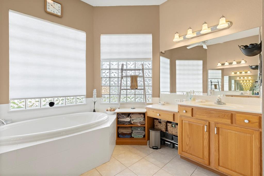 11839 Southeast 173rd Ln Road Summerfield, FL 34491 - Photo 27 of 49 a large white kitchen with a large window