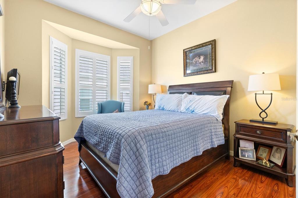 11839 Southeast 173rd Ln Road Summerfield, FL 34491 - Photo 28 of 49 a bedroom with a bed and a fireplace