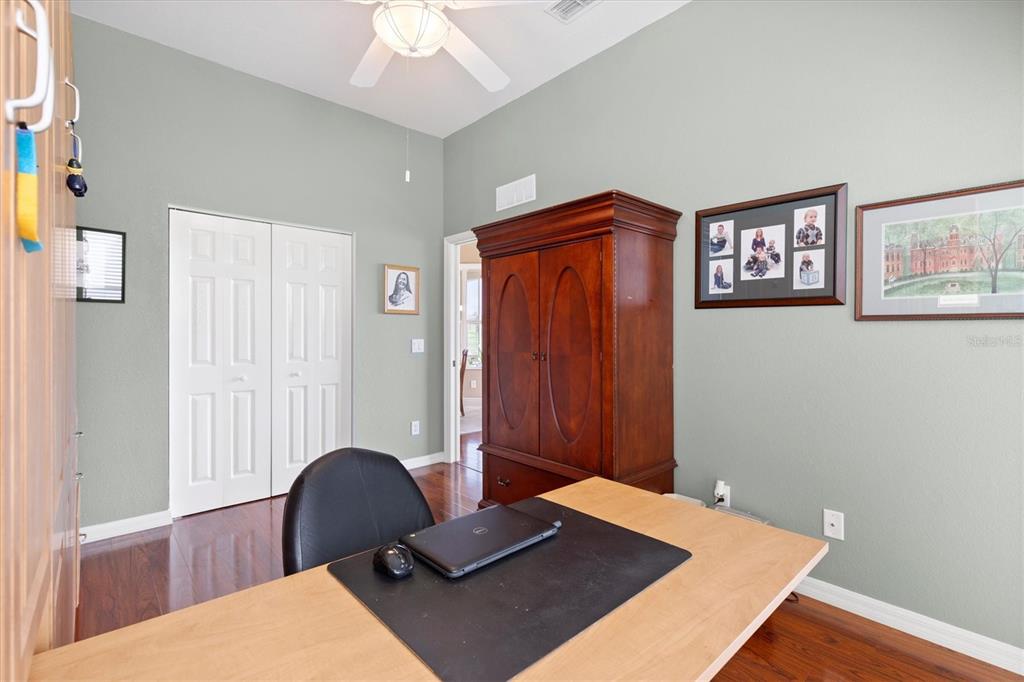 11839 Southeast 173rd Ln Road Summerfield, FL 34491 - Photo 32 of 49 a workspace with furniture and a window