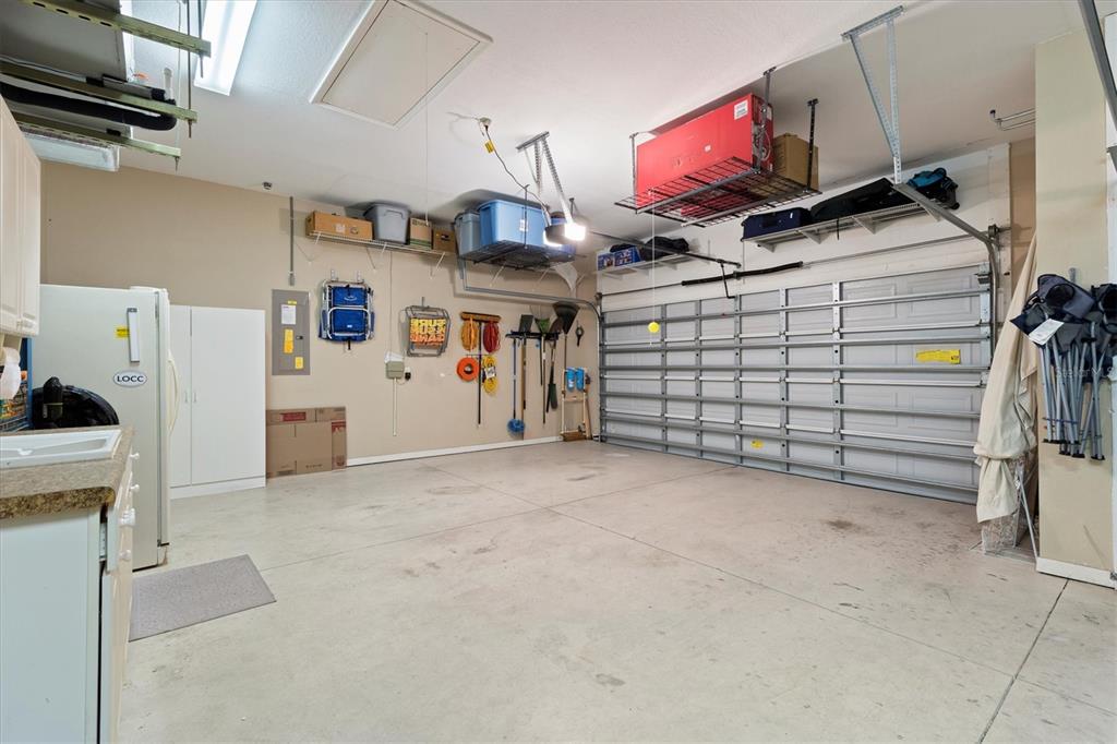 11839 Southeast 173rd Ln Road Summerfield, FL 34491 - Photo 35 of 49 a view of a garage with storage