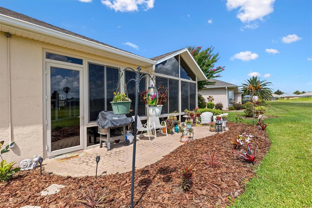11839 Southeast 173rd Ln Road Summerfield, FL 34491 - Photo 39 of 49 a front view of a house with garden