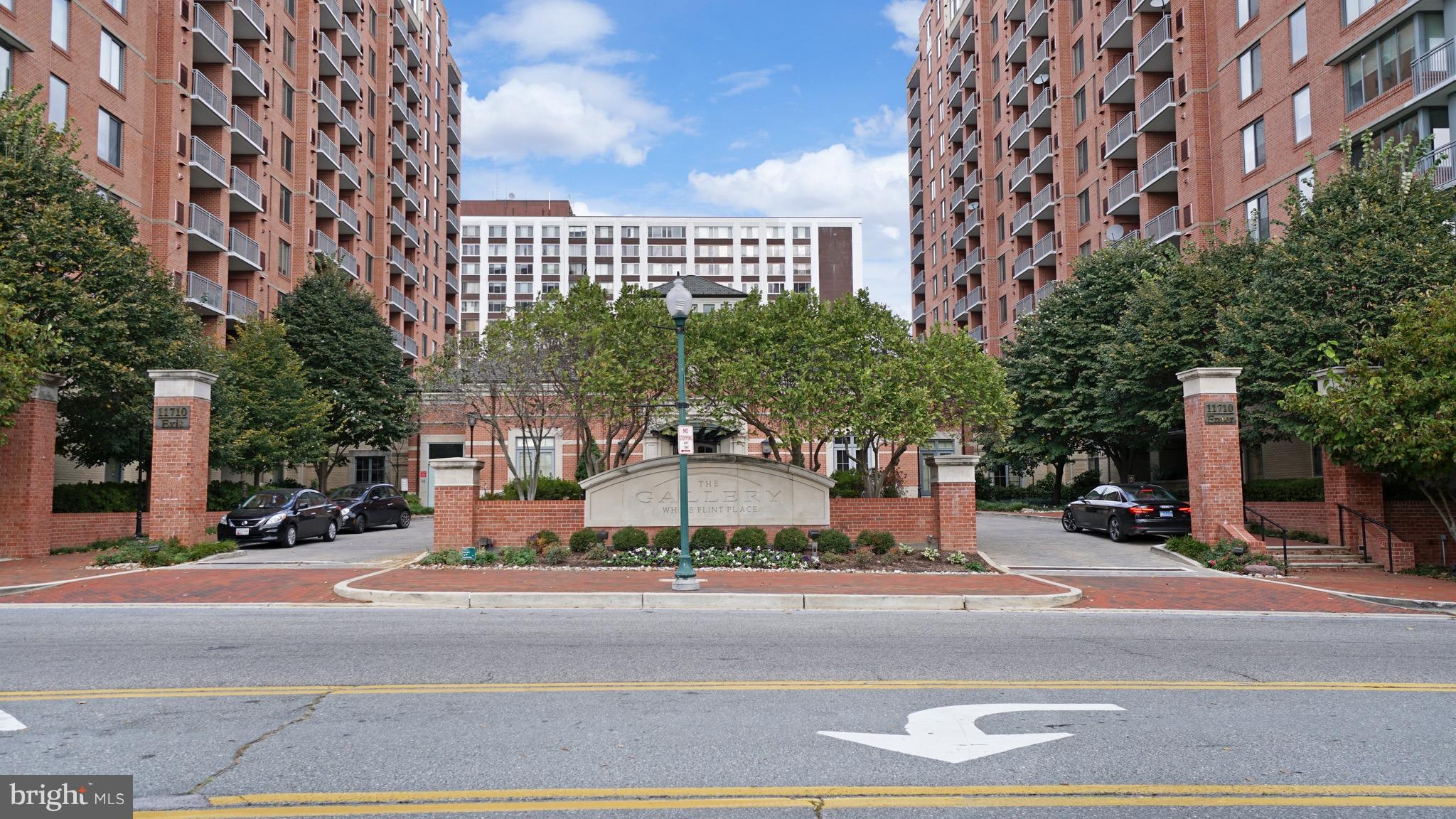 a view of a building with a street