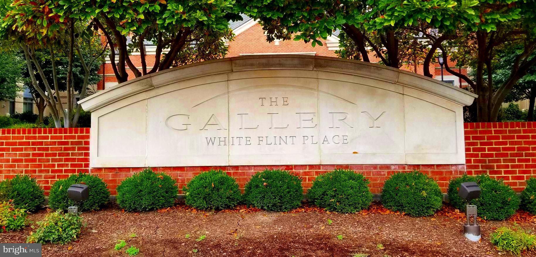 11710 Old Georgetown Road, Unit 1026 Rockville, MD 20852 - Photo 2 of 22 a sign on the side of a building