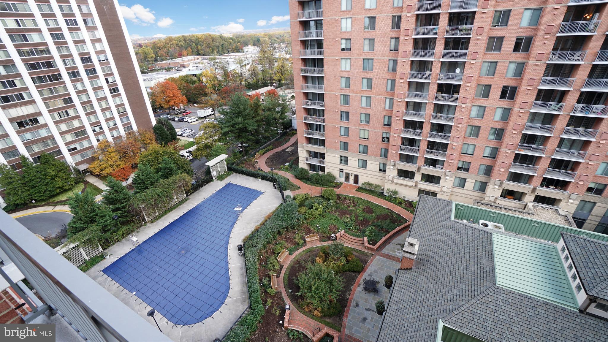 11710 Old Georgetown Road, Unit 1026 Rockville, MD 20852 - Photo 15 of 22 a view of a balcony with a bench