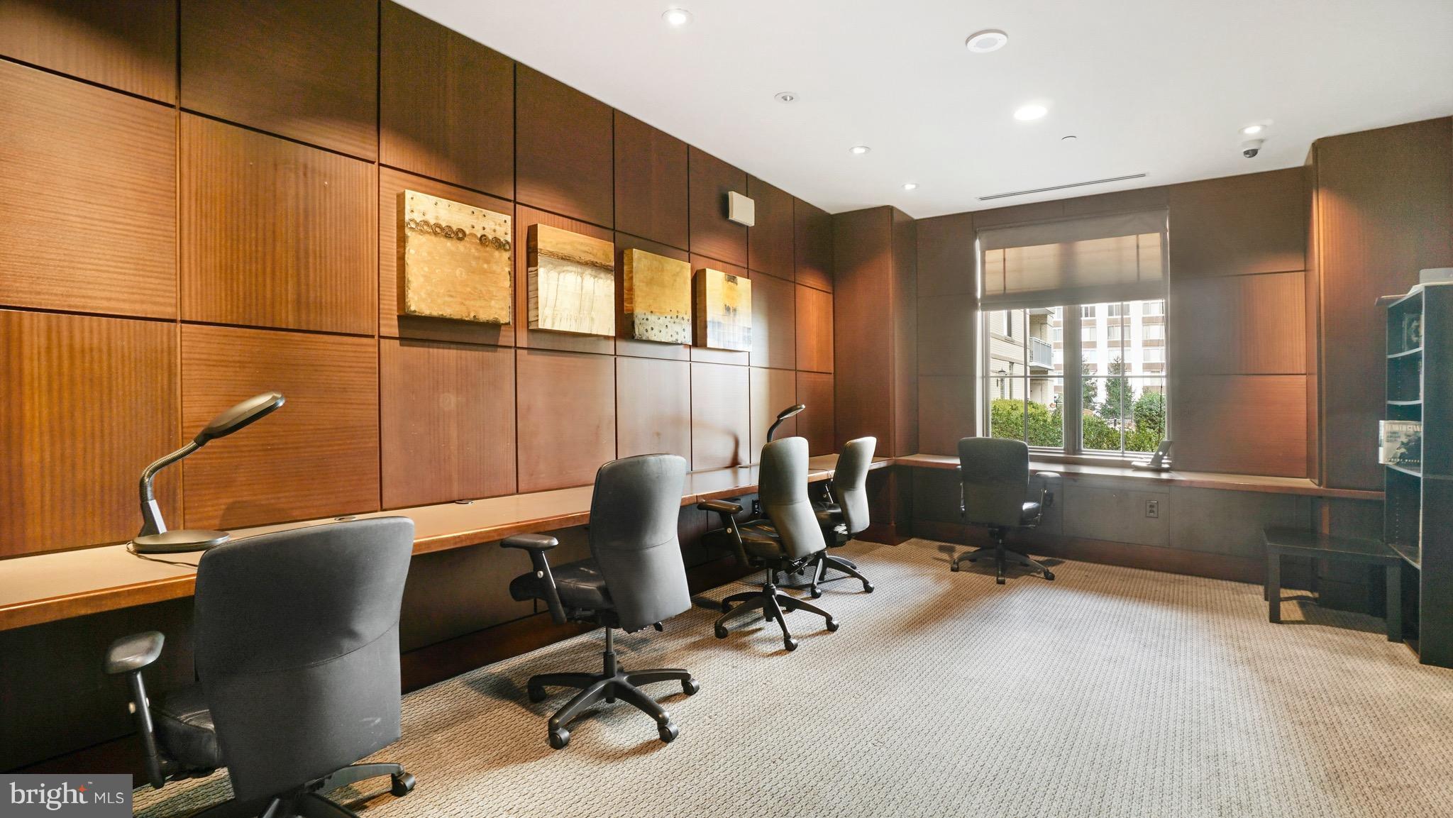 11710 Old Georgetown Road, Unit 1026 Rockville, MD 20852 - Photo 21 of 22 a view of a workspace with furniture and a window