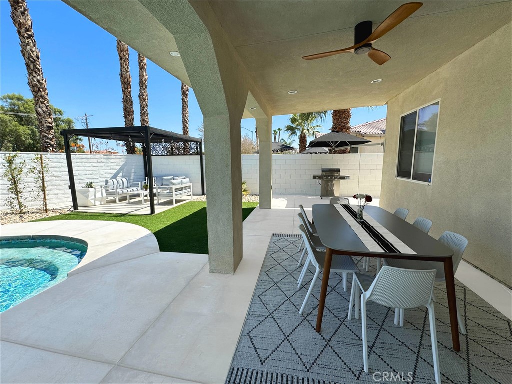 43244 Freesia Place Indio, CA 92201 - Photo 16 of 17 a view of yard from outdoor seating area
