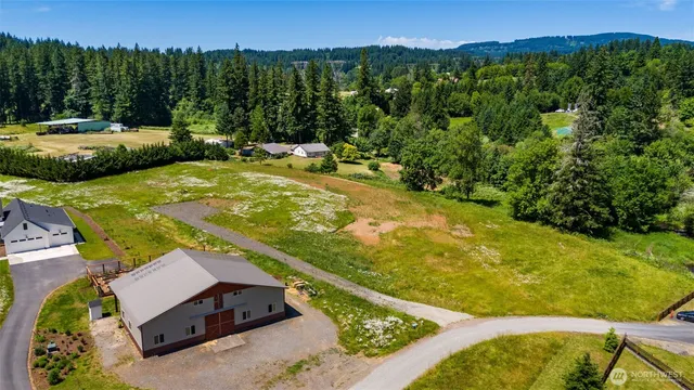 a view of a city with mountains in the background