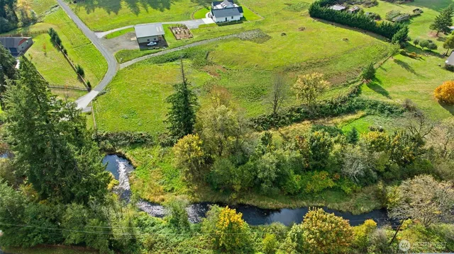 a view of a black white and white house