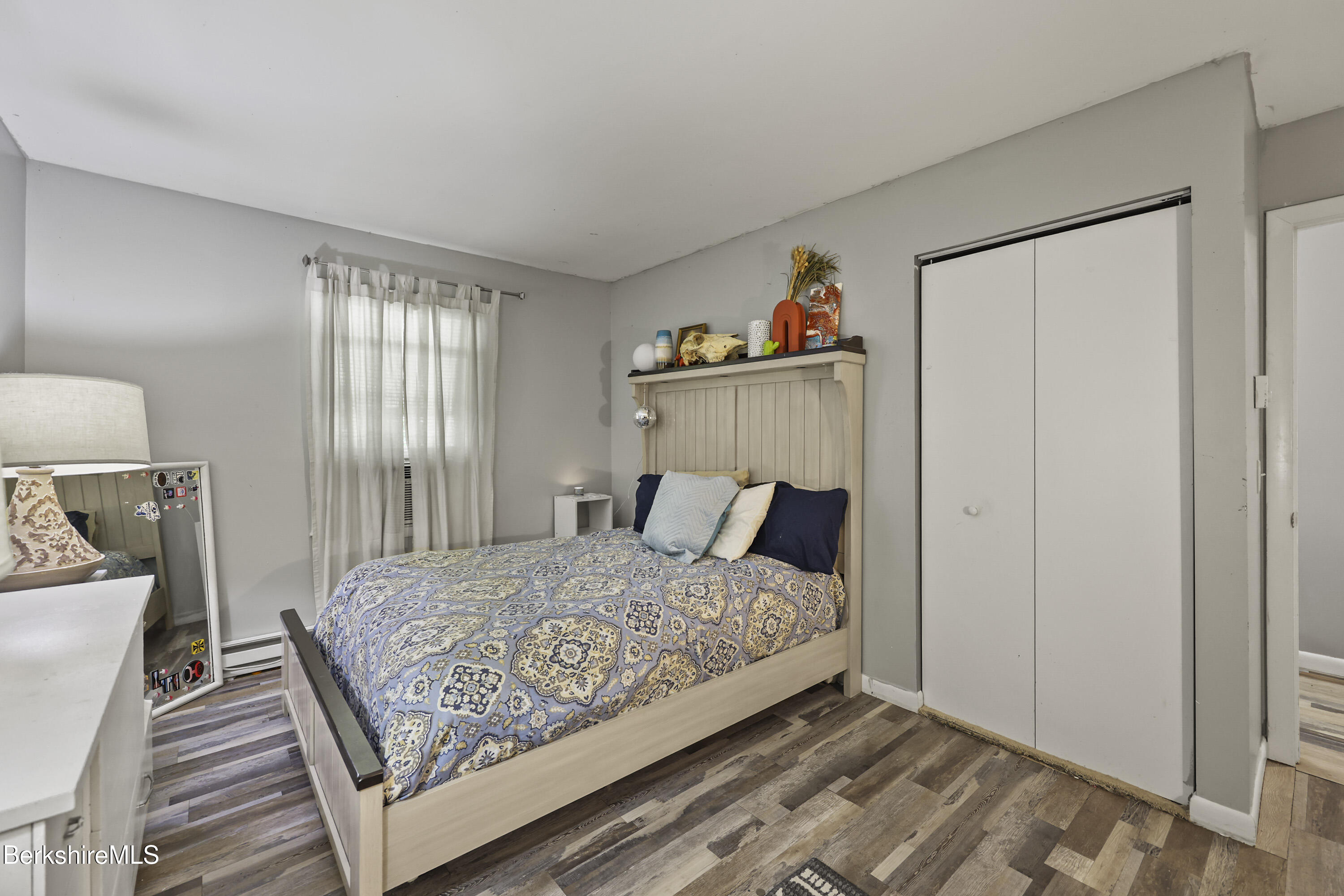 1052 Beaver Pond Meadows Road Williamstown, MA 01267 - Photo 14 of 38 a bedroom with a bed and a window