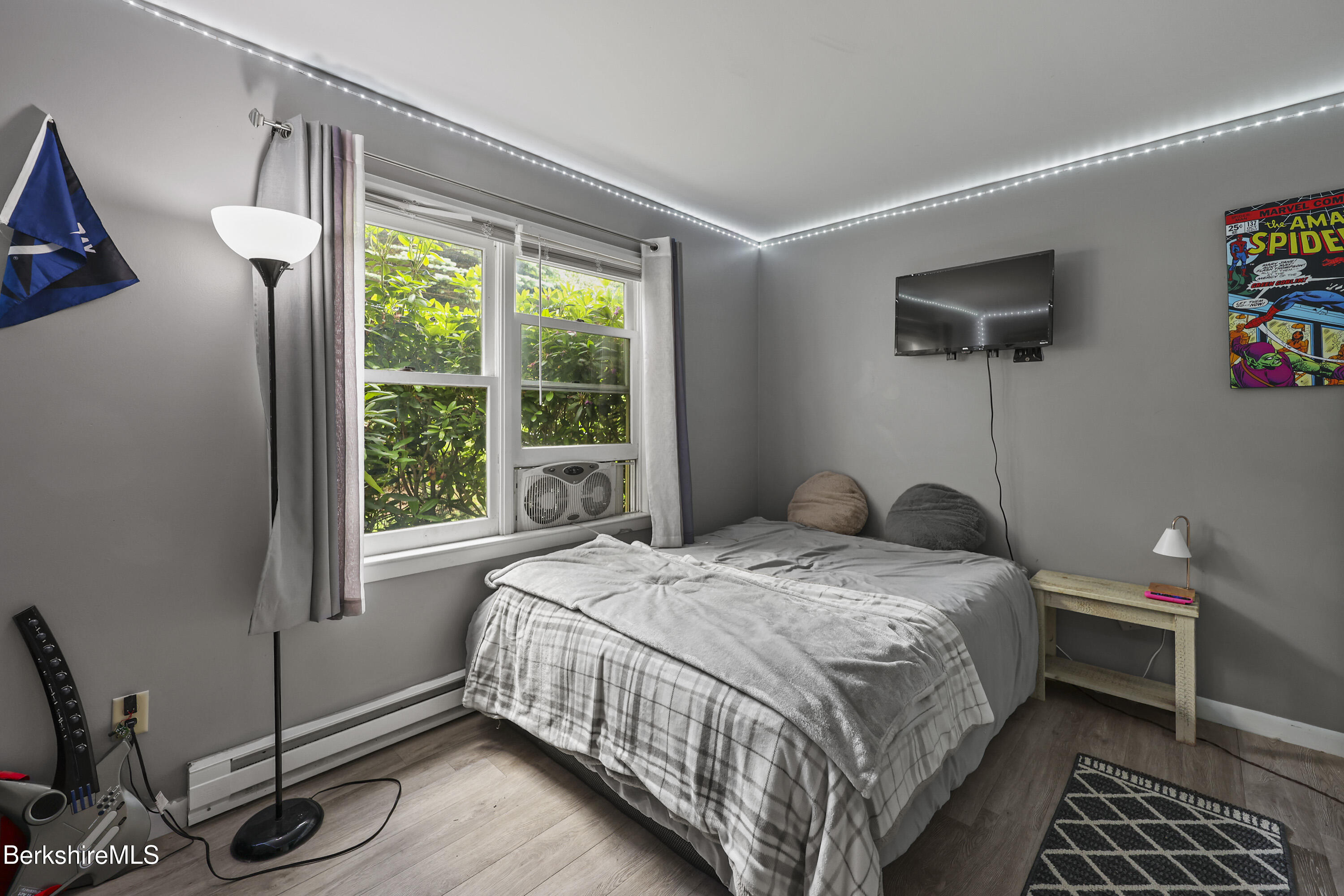 1052 Beaver Pond Meadows Road Williamstown, MA 01267 - Photo 16 of 38 a bedroom with a bed and a window