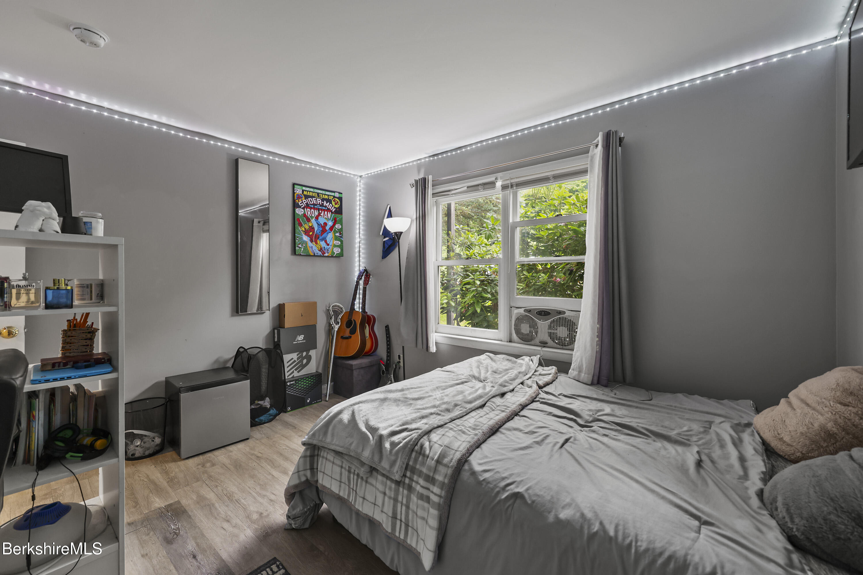 1052 Beaver Pond Meadows Road Williamstown, MA 01267 - Photo 18 of 38 a bedroom with a bed and a large window