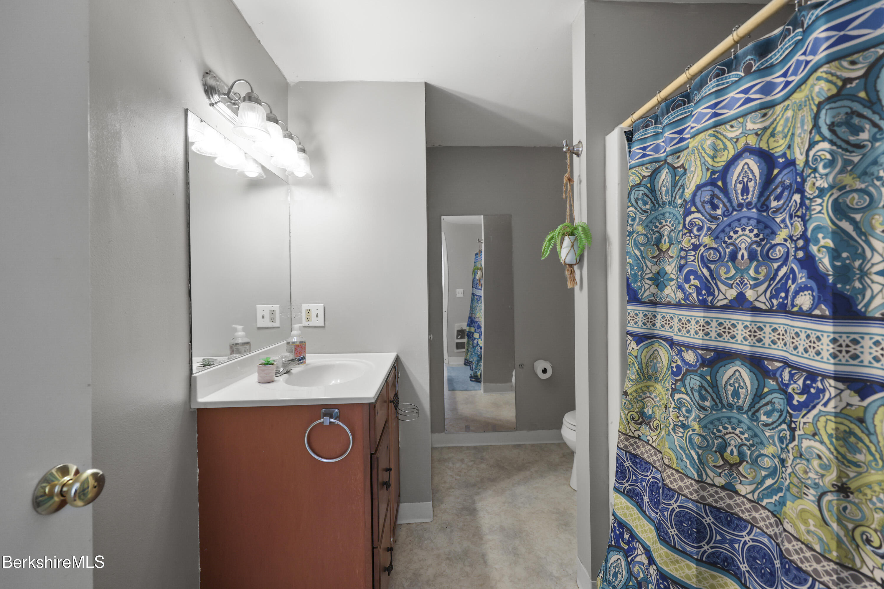 1052 Beaver Pond Meadows Road Williamstown, MA 01267 - Photo 26 of 38 a bathroom with a sink mirror and vanity