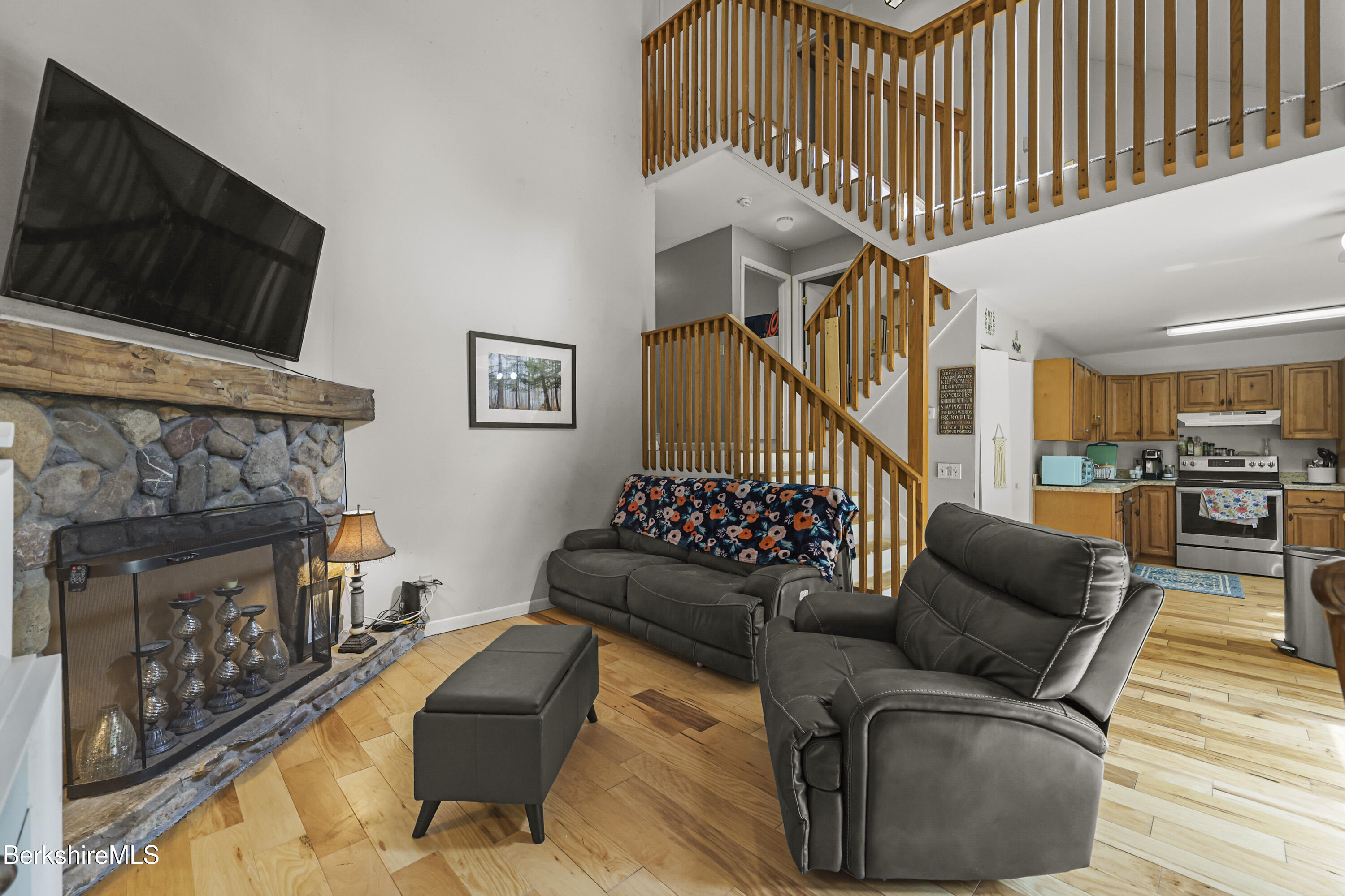 1052 Beaver Pond Meadows Road Williamstown, MA 01267 - Photo 4 of 38 a living room with furniture and a flat screen tv