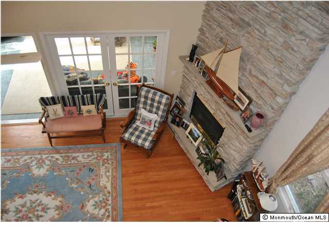 2105 Miller Road Point Pleasant, NJ 08742 - Photo 2 of 12 a living room with furniture and a fireplace