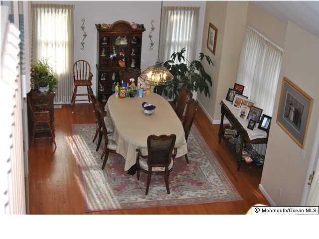 2105 Miller Road Point Pleasant, NJ 08742 - Photo 5 of 12 a living room with furniture and wooden floor