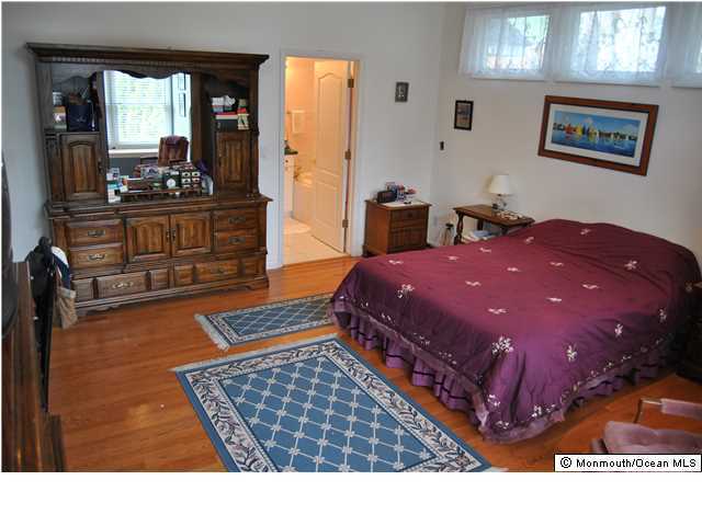 2105 Miller Road Point Pleasant, NJ 08742 - Photo 7 of 12 a living room with furniture and a rug
