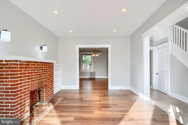 a view of livingroom with wooden floor