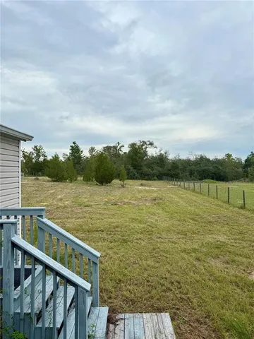 a view of a lake from a balcony