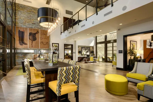 a view of a lake with boats and trees in the background