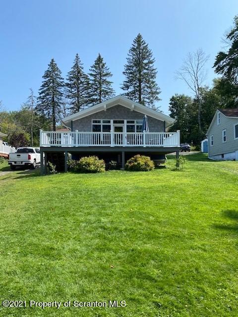 18 Power Line Road Scott Township, PA 18433 - Photo 1 of 34 a view of a big house with a big yard and potted plants