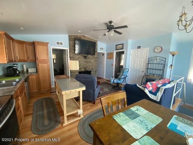 18 Power Line Road Scott Township, PA 18433 - Photo 11 of 34 a living room with furniture and a flat screen tv