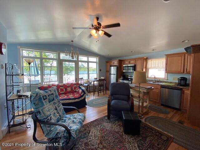 18 Power Line Road Scott Township, PA 18433 - Photo 15 of 34 a living room with furniture and a large window