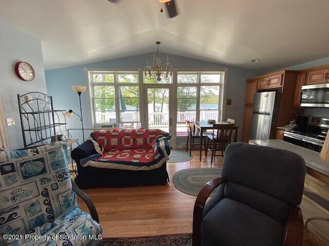 18 Power Line Road Scott Township, PA 18433 - Photo 16 of 34 a living room with furniture fireplace and a large window