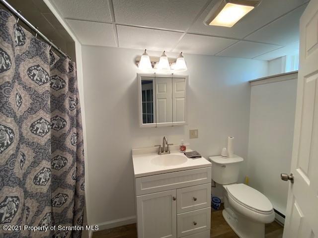 18 Power Line Road Scott Township, PA 18433 - Photo 23 of 34 a bathroom with a toilet sink and mirror
