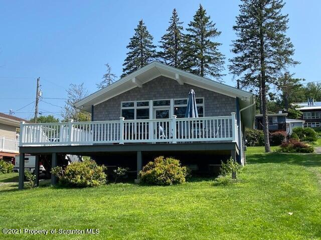 18 Power Line Road Scott Township, PA 18433 - Photo 31 of 34 a view of a house with a garden and deck