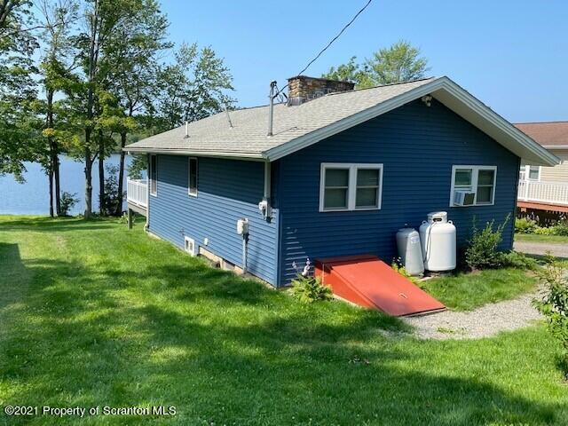 18 Power Line Road Scott Township, PA 18433 - Photo 33 of 34 a front view of a house with yard and green space