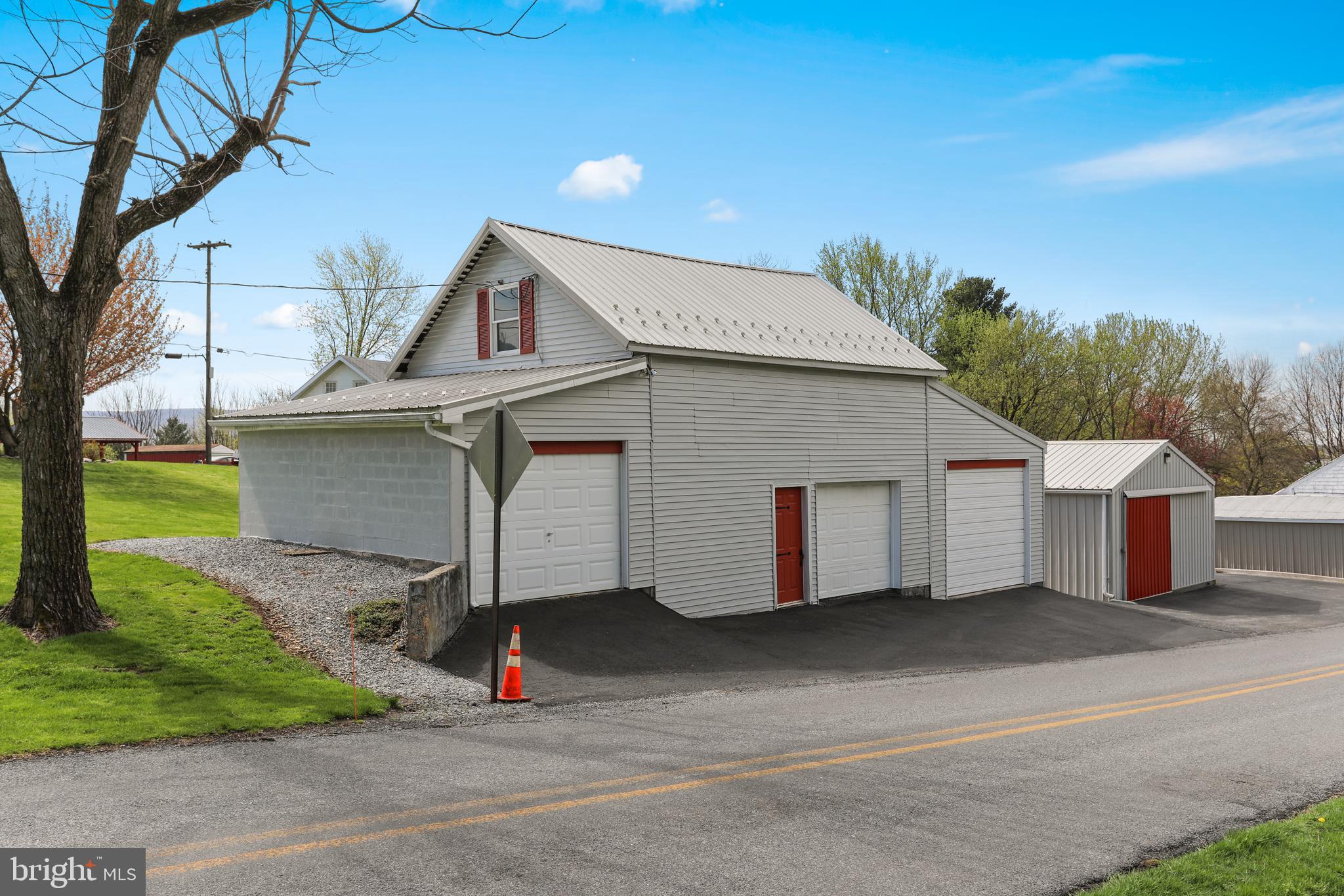 14306 Barkdoll Road Smithsburg, MD 21783 - Photo 10 of 55 3 car garage plus huge metal building.