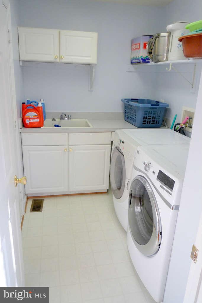10391 Wetherburn Road Woodstock, MD 21163 - Photo 15 of 30 Laundry Room
