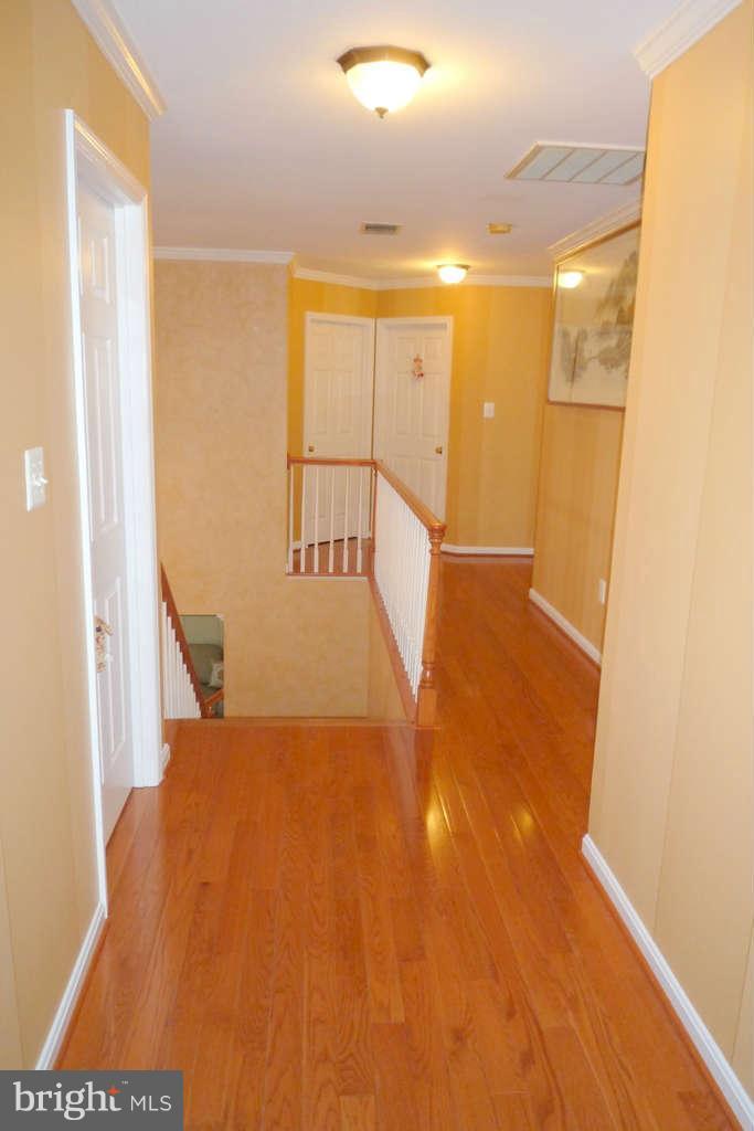 10391 Wetherburn Road Woodstock, MD 21163 - Photo 21 of 30 2nd Floor Hallway