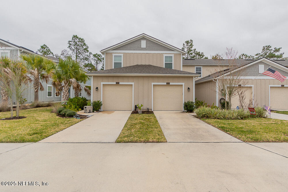 957 Observatory Parkway Jacksonville, FL 32218 - Photo 1 of 27 front view of house with a yard