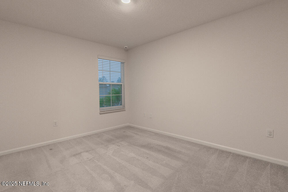 957 Observatory Parkway Jacksonville, FL 32218 - Photo 17 of 27 an empty room with a window