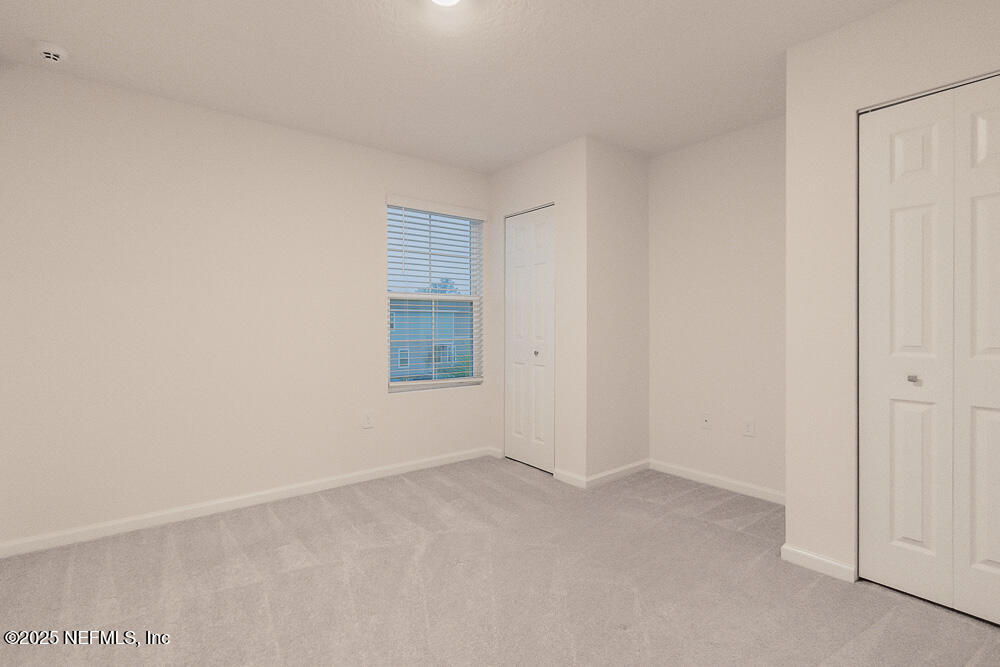 957 Observatory Parkway Jacksonville, FL 32218 - Photo 20 of 27 a view of an empty room and window