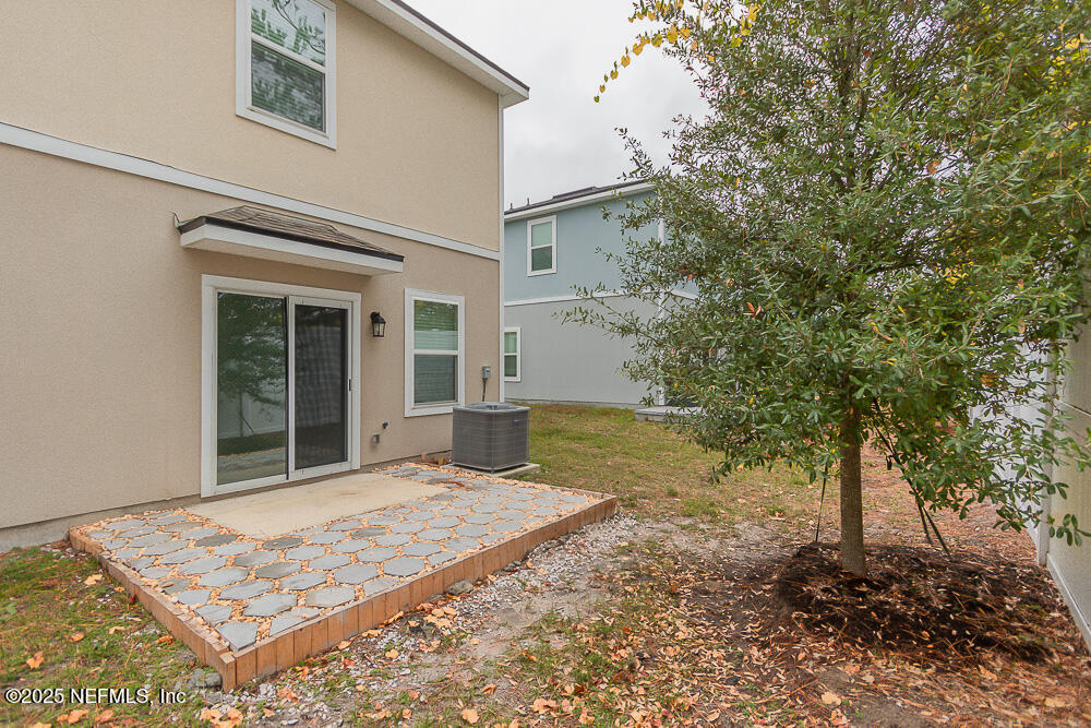 957 Observatory Parkway Jacksonville, FL 32218 - Photo 25 of 27 a view of a house with a yard