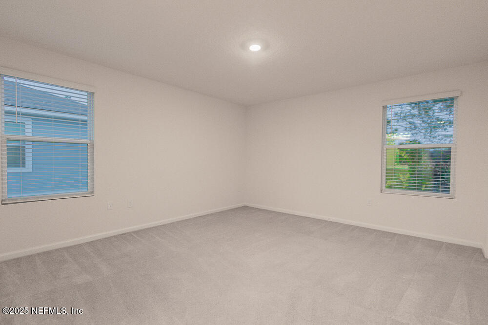 957 Observatory Parkway Jacksonville, FL 32218 - Photo 4 of 27 an empty room with a window