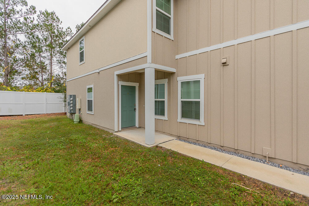 957 Observatory Parkway Jacksonville, FL 32218 - Photo 6 of 27 a view of a backyard of the house