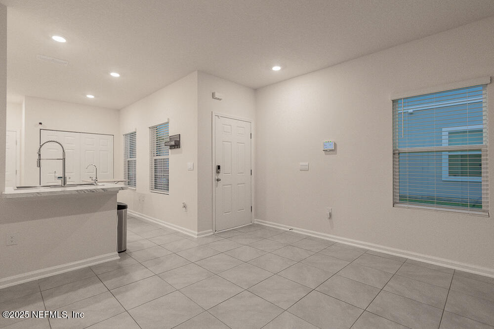 957 Observatory Parkway Jacksonville, FL 32218 - Photo 7 of 27 a view of a kitchen with a sink and a window