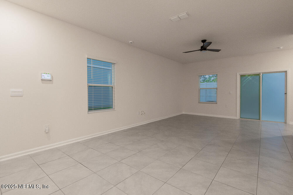 957 Observatory Parkway Jacksonville, FL 32218 - Photo 9 of 27 a view of an empty room with a window