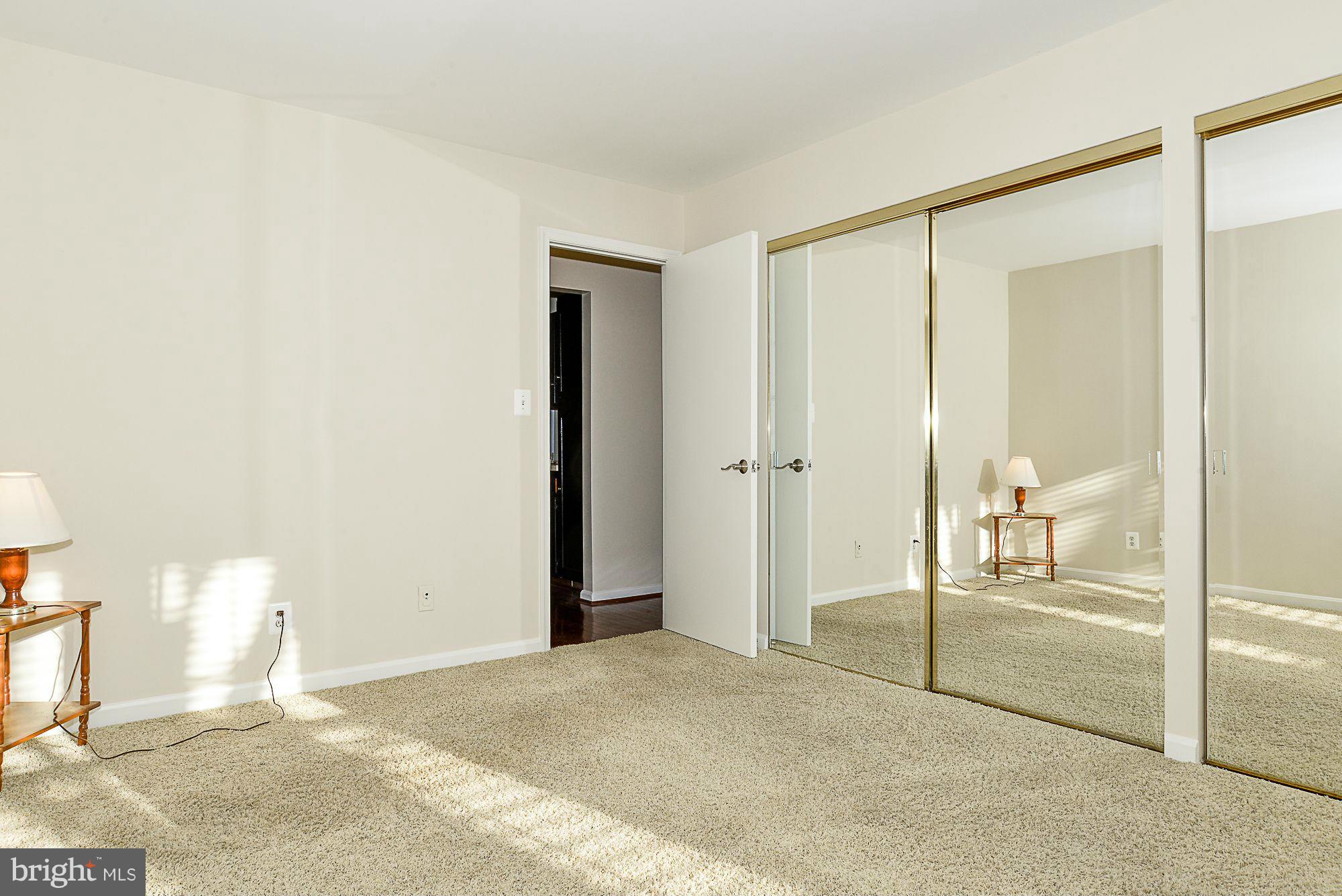 5932 Cove Landing Road, Unit 201D Burke, VA 22015 - Photo 13 of 24 a view of an empty room