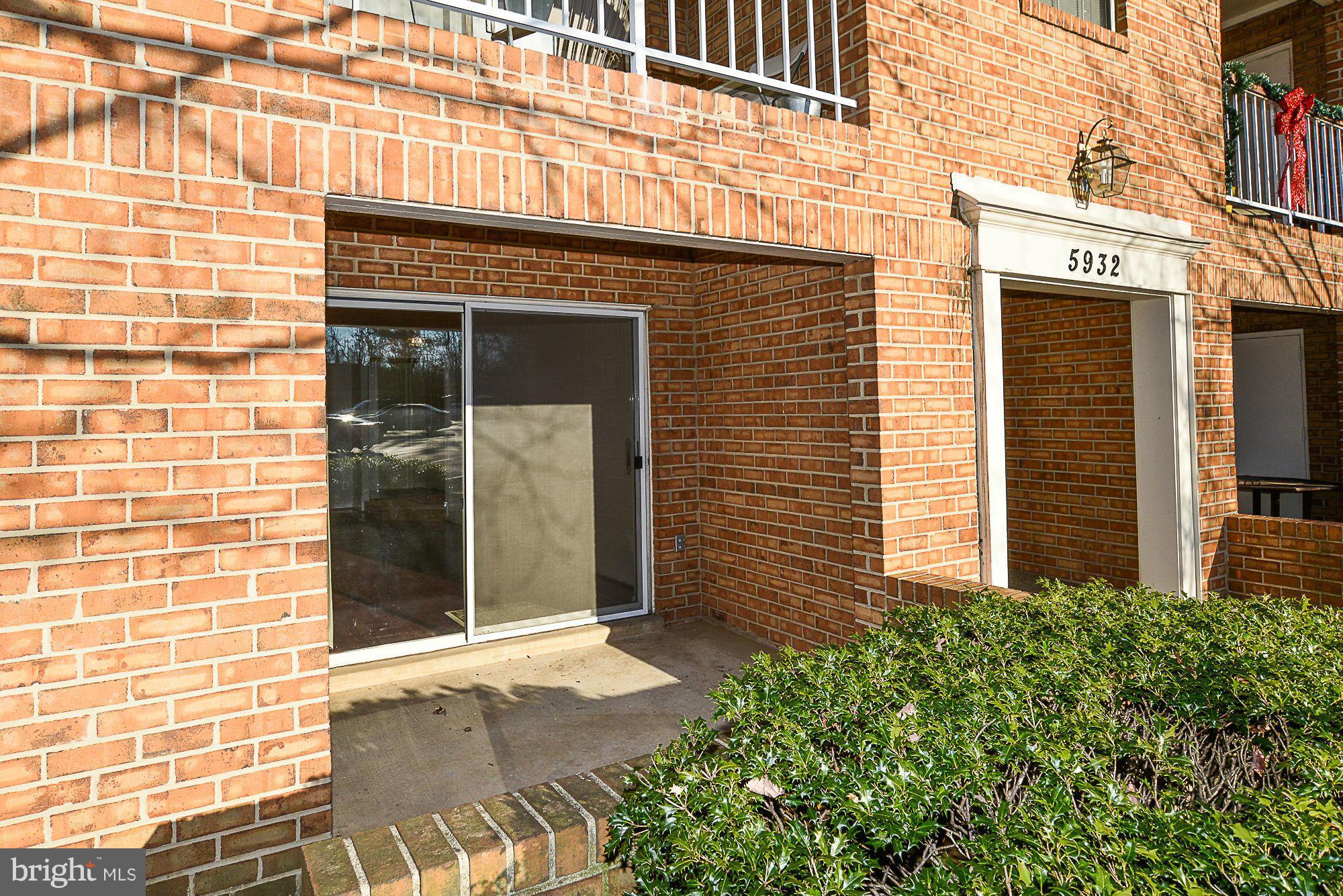 5932 Cove Landing Road, Unit 201D Burke, VA 22015 - Photo 19 of 24 a view of a building on the side of street