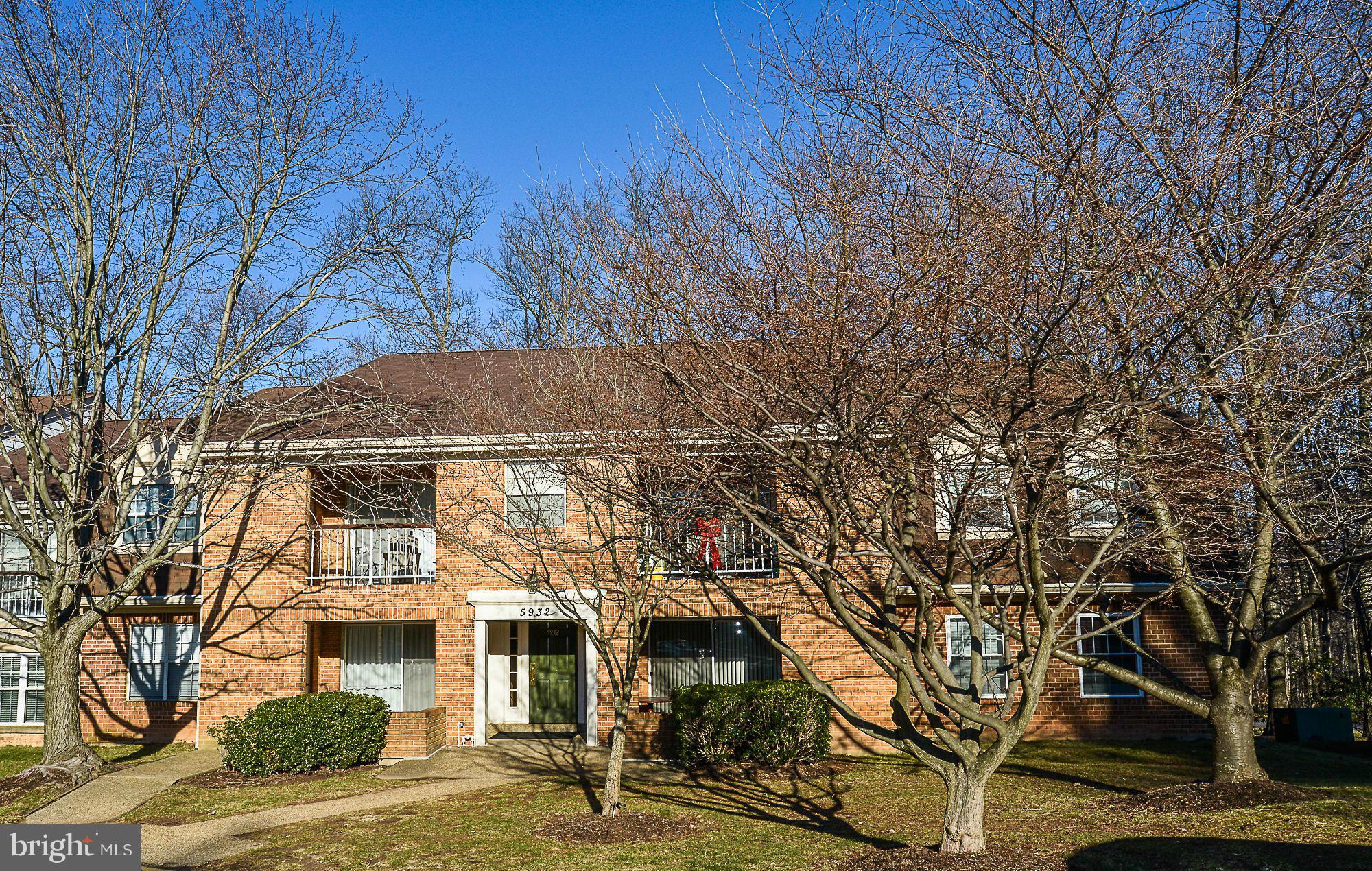 5932 Cove Landing Road, Unit 201D Burke, VA 22015 - Photo 20 of 24 front view of house with a street