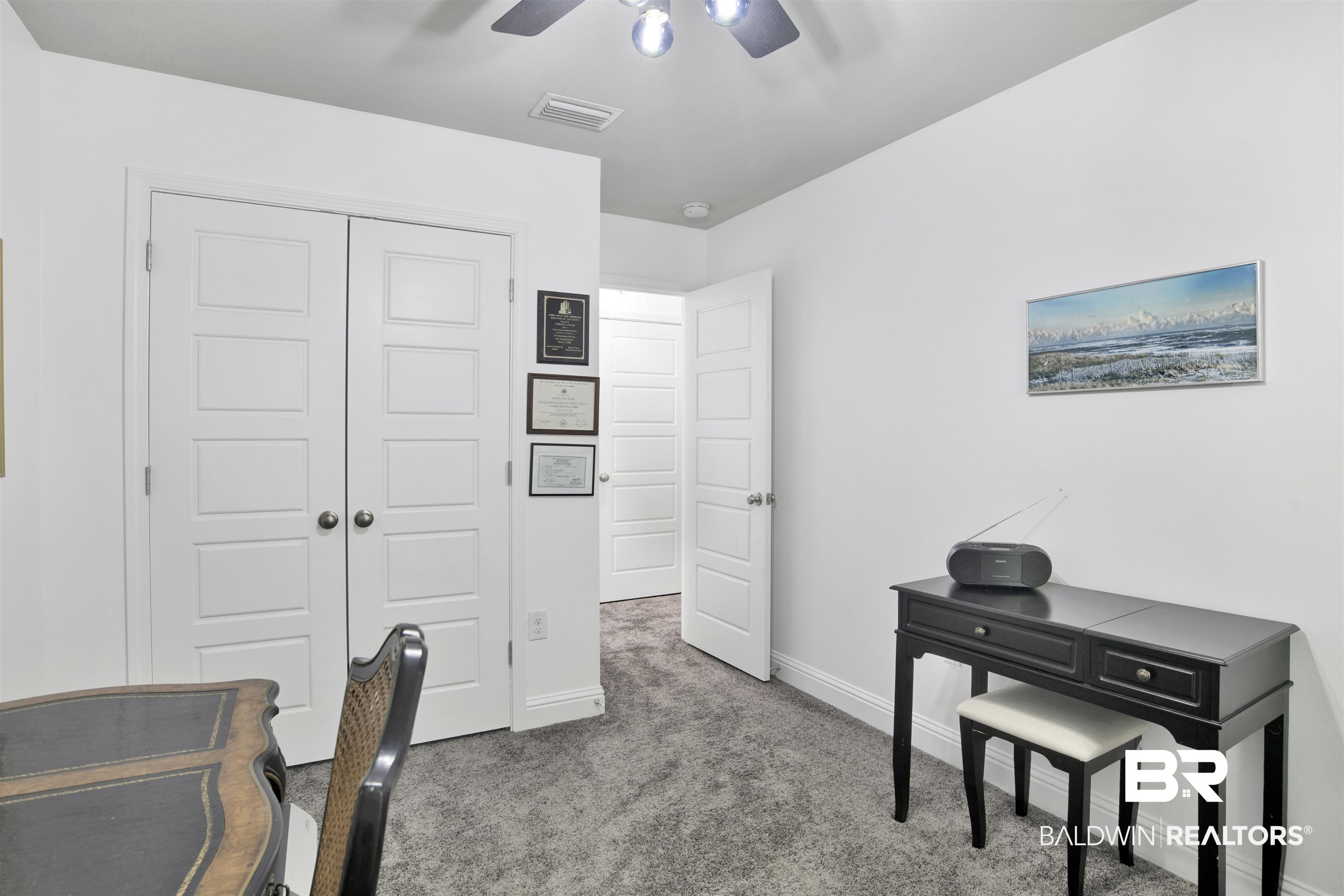 25806 Pollard Road, Unit 20 Daphne, AL 36526 - Photo 21 of 29 Home office featuring carpet floors and ceiling fan